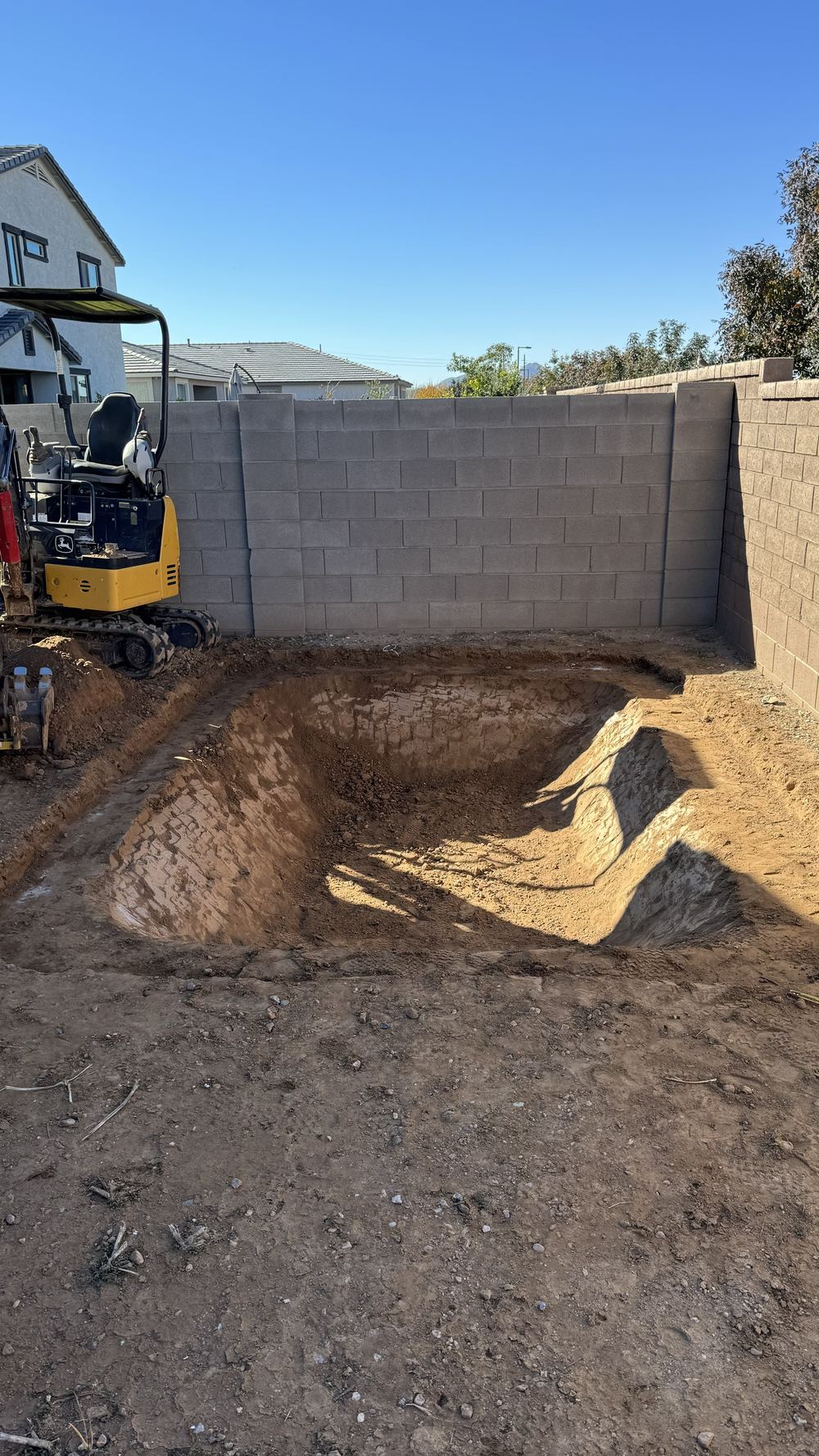 Trampoline hole dug and ready for the frame
