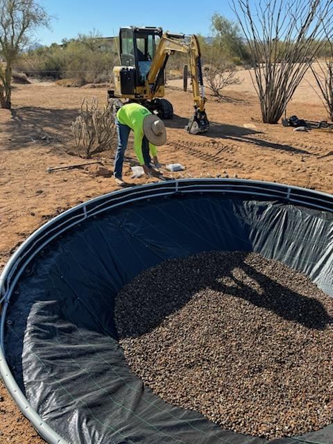 Trampoline frame set into the finished hole